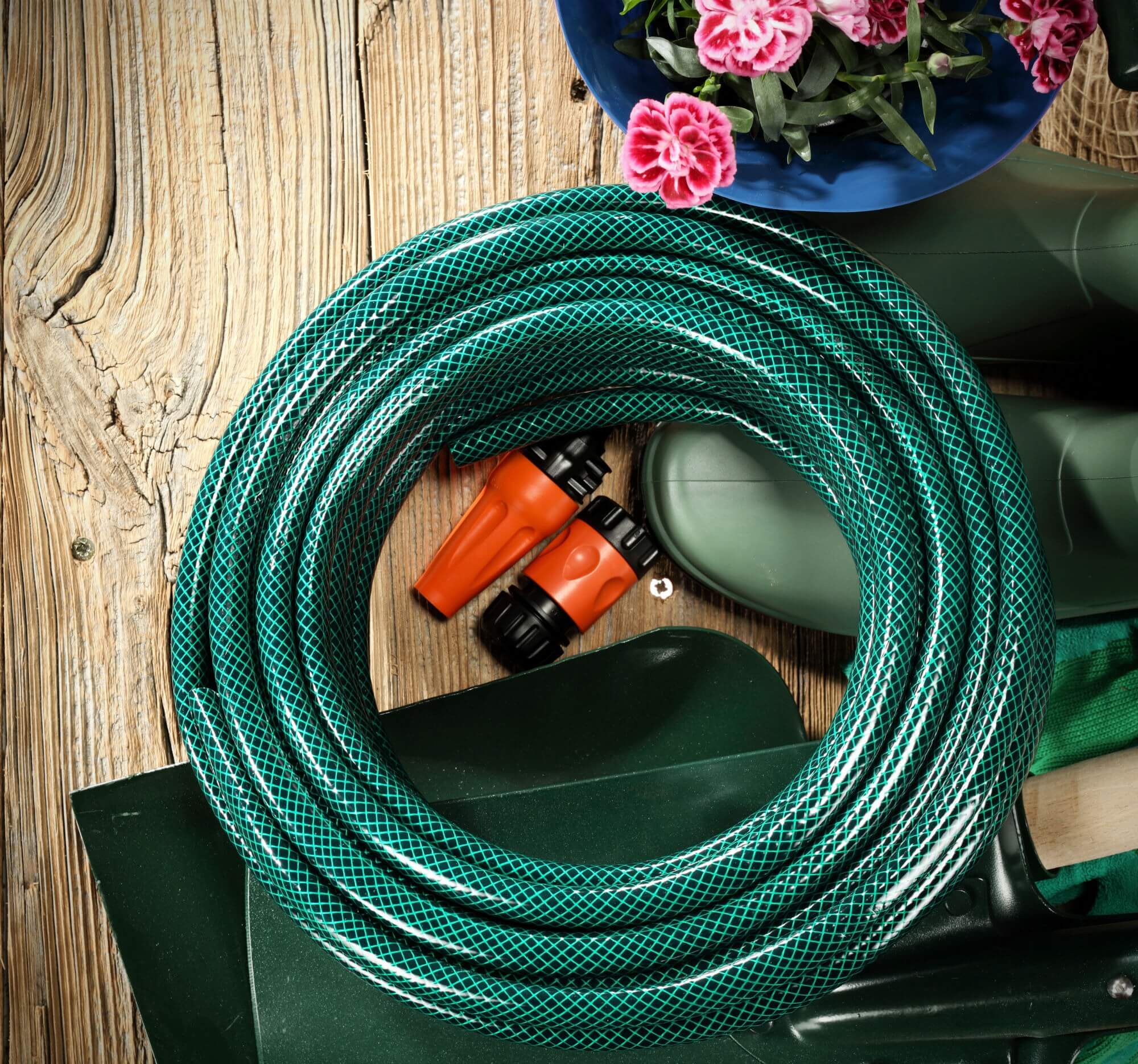 A green garden hose